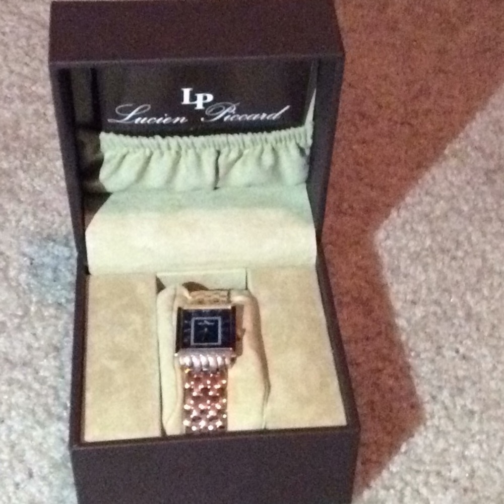 Watch with booklet
